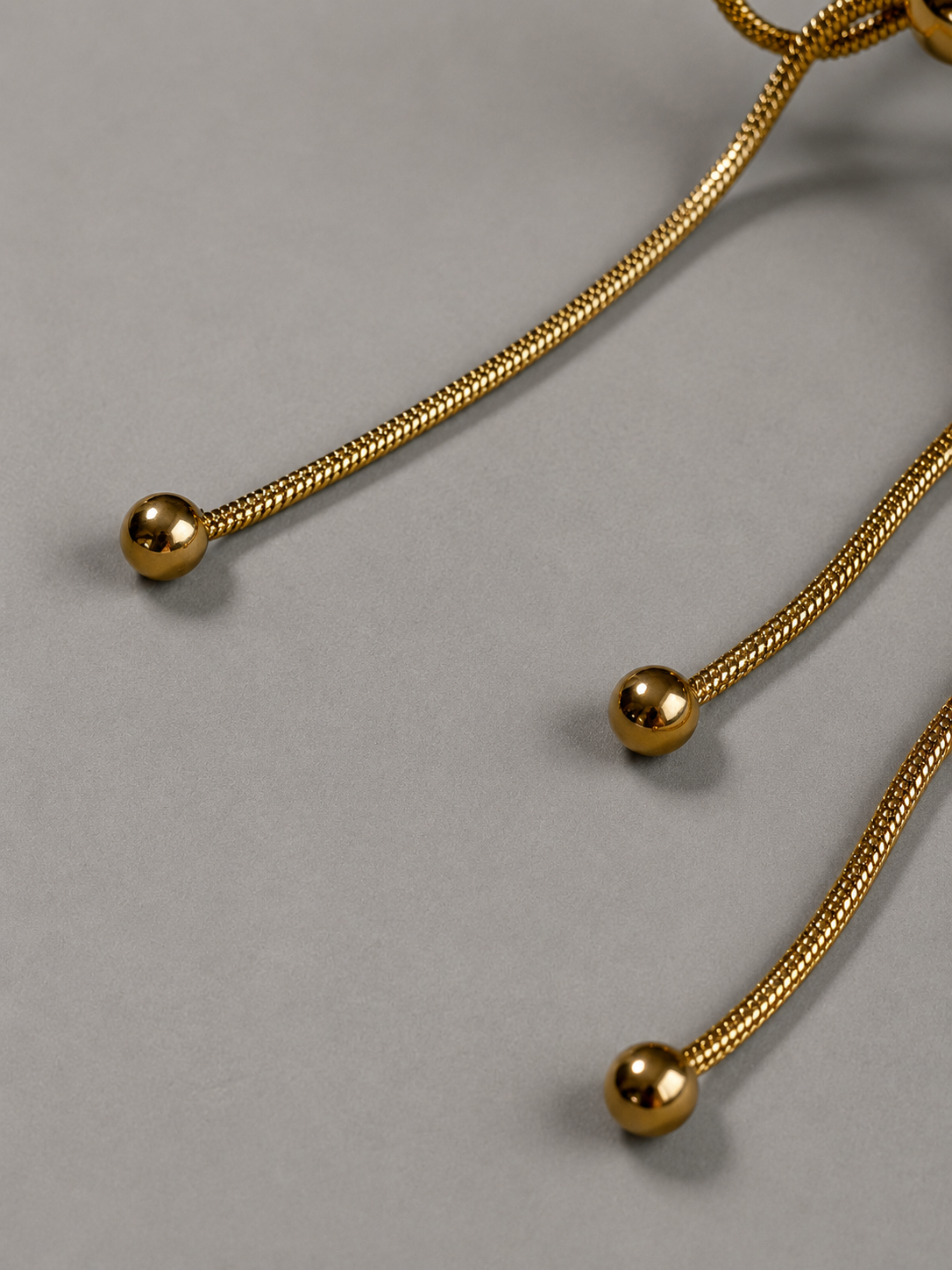 Nouer Pierce P023 リボンピアス P023  金属アレルギー対応ステンレス製のスネークチェーンの端も丸形になっている